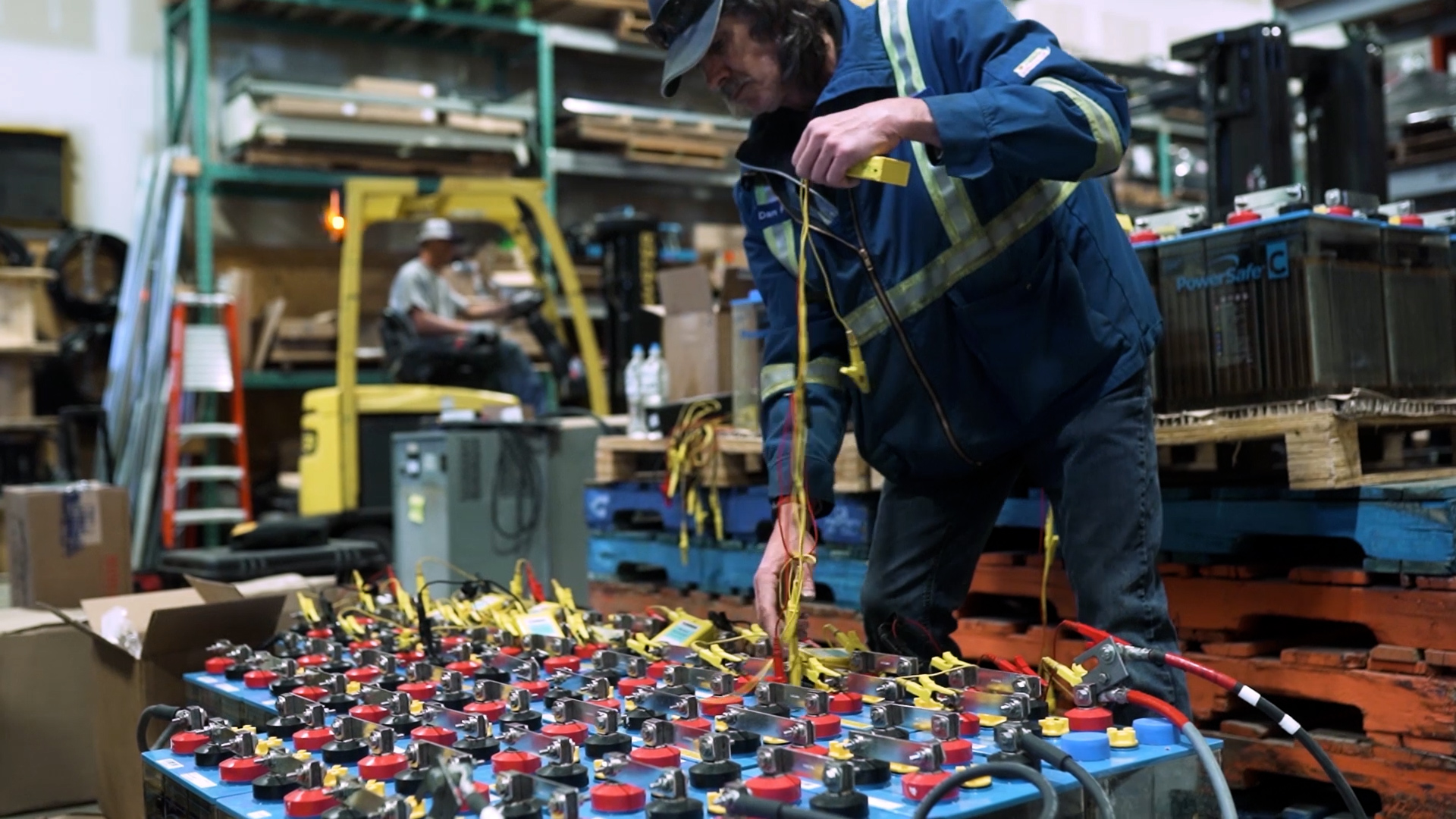 Battery Electric worker working with wires