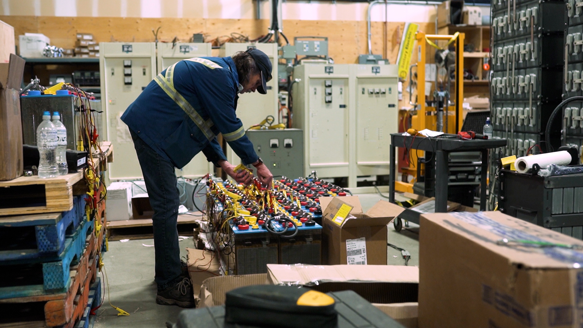 Battery-Electric-B-Roll-Image-4 battery electric employee with batteries